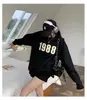 Moletom Americano Retrô com Forro de Lã e Gola Redonda para Mulheres Primavera, Outono, Inverno 2026 Versátil Casual Estudante Solto Estampado Top para Mulheres