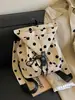 Mochila de Estilo Coreano Ins con Lunares de Nicho para Mujer, Nueva Mochila Pequeña Ligera Elegante para Estudiantes y Viajeros de Verano 2026 para Mujer