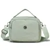 Bolsa transversal estilosa de nylon para mulheres, com múltiplos compartimentos, design leve e formato quadrado casual, perfeita para carregar um celular