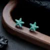 Brincos Cluster de Diamante Cheio de Novo Estilo Transfronteiriços para Homens, Modernos e Versáteis, Brincos de Flor de Íris em Forma de Cruz de Alto Padrão para Mulheres