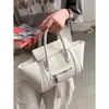 Bolso de Mano Texturizado de Moda Primavera para Mujer 2026 Nuevo Bolso Simple de Ala Bolso Tote Pequeño Versátil Venta al por Mayor