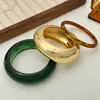 Pulsera Abierta Personalizada con Resina de Ámbar Difuminada Transfronteriza Europea y Americana para Mujer Moda Ins Anillo de Metal Pulido Pulsera Brillante