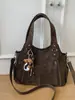 Bolsa de Mão Versátil Nova Outono e Inverno 2025 Bolsa de Ombro Feminina Bolsa Tote de Grande Capacidade para o Dia a Dia Bolsa Transversal Bolsa de Viagem