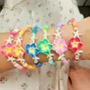 Pulseira Bohemian Europeia e Americana Transfronteiriça Frangipani Tecida à Mão Pulseira Retrô Estrela do Mar Turquesa Cerâmica Macia Pérola