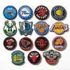 La fábrica de origen elabora expertamente logotipos y emblemas personalizados de equipos de la NBA, sellos de goma de caucho blando de PVC para artículos deportivos
