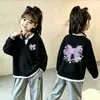 Top de punto gofre estilo coreano, imitación de dos piezas, manga larga para niñas, nuevo estilo primavera/otoño para niños medianos y grandes, versátil, elegante, capa base holgada