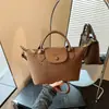 Bolso de hombro nuevo tejido simple y elegante para el día a día de otoño, bolso tipo cubo de moda, bolso cruzado para mujer estilo coreano