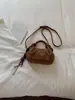 Bolso pequeño cuadrado de gamuza con textura retro transfronterizo para mujer, nuevo bolso versátil y elegante para el hombro y cruzado de 2026