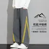 Pantalones funcionales de exterior de moda estilo americano para hombre, nueva colección primavera/otoño, casual, corte holgado, talla grande, versátiles, pantalones atléticos de pierna recta