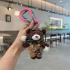 Muñeca Linda con Cámara Juguete Creativo Estilo Coreano Colgante de Bolso Adorable Mono con Bufanda Llavero de Oso de Peluche