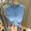 Camiseta sin mangas para mujer Verano 2022 Nueva Camiseta Interior Base Viento de Deseo Puro Chaleco Base Ajustado