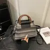 Bolso Cruzado de Hombro Único de Moda Tejido con una Textura Simple, Nuevo Estilo para Primavera 2026, Bolso Cuadrado Pequeño de Nicho para Mujer