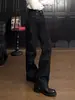 Jeans de mezclilla cruda de pierna ancha para hombre, estilo americano, con remaches turquesa, silueta estructurada y superpuesta, diseño de pierna recta y versátiles pantalones largos.