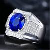 Anel de safira com diamante grande e dominante de boca aberta, ouro branco com diamantes incrustados, tesouro colorido, grupo de diamantes totalmente incrustados, anel de diamante azul