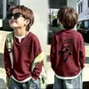 Camiseta de punto gofrado para niños, imitación de dos piezas, manga larga, nuevo estilo para primavera y otoño, para niños medianos y mayores, elegante, casual, versátil, cuello redondo, camiseta interior