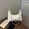 Modelo Nuevo Primavera 2026 Lentejuelas de Estrella Moda de Alto Estilo Bolso Casual Versátil Simple de Gran Capacidad para Hombro o Axila