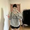 Nueva colección de principios de otoño: sudadera con capucha para mujer con estampado de notas musicales y gatos, con un look sofisticado y elegante, chaqueta gris oversized