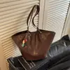 Bolsa feminina transfronteiriça retrô de grande capacidade 2026 primavera-verão nova bolsa de ombro casual bolsa tote versátil para o dia a dia
