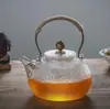 Tetera de vidrio con patrón de martillo tetera con asa de cobre tetera resistente a altas temperaturas tetera para juego de té Kung Fu