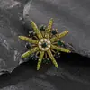 Broche de Copo de Nieve de Moda Exquisita Europeo y Americano para Mujer, Aleación Pedrería Estrella de Ocho Puntas Elegante Versátil Accesorio para Chaqueta de Traje Pin de Solapa
