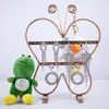 Nuevo y lindo expositor de pendientes de mariposa al por mayor moda exquisitos pendientes estante para joyas estante de joyas de hierro