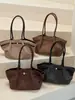 Bolsa Saco Versátil Simples de Luxo Feminina 2026 Outono Inicial Nova Tendência Estilo Coreano Exquisite Elegante Bolsinha de Mão Ombro