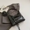 Bolso de axila de gran capacidad estilo coreano para mujer, bolso de trabajo, nuevo modelo primavera 2026, bolso tipo cubo biker con tachuelas, bolso cruzado