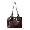 Bolso de mano 2024 nuevo, bolso de viaje de gran capacidad, diseño retro de nicho, bolso de hombro simple, bolso de axila para mujer