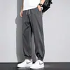 Pantalones deportivos casuales para hombre, ligeros de verano 2026 nuevo estilo, pantalones largos versátiles de alta calle americana para hombre