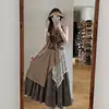 Falda de retazos estilo páramo para mujer, principios de otoño, adecuada para vacaciones en Dali, Yunnan, falda larga irregular de cintura alta