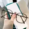 Nuevo marco redondo liso estilo coreano TR90 ultraligero espejo plano mismo estilo Caperucita Roja para mujer se puede combinar con gafas para miopía moda