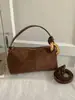 2025 Nova Bolsa de Mão de Alta Qualidade com Textura, Moda Versátil, Tendência, Nicho para Mulheres, Bolsa de Ombro Simples Casual, Bolsa Transversal