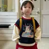 Conjunto de niño estilo coreano 2026 otoño nuevo sudadera de dos piezas falsas de dibujos animados pantalones de chándal con estampado de dibujos animados rojos conjunto de moda