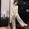 Pijamas de Seda de Hielo para Mujer 2026 Primavera y Otoño Manga Larga Tacto de Alta Gama Ropa Exterior Ropa de Casa Conjunto de Dos Piezas Venta al por Mayor desde Tiendas Físicas Damas
