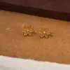 Pendientes Xuping con diseño de estrella, flor y mariposa, para mujer, estilo japonés y coreano, con pequeñas orejas de hueso, con corona de amor.