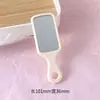 Peine mini lindo estilo Ins de colores dulces con espejo de maquillaje portátil, alto valor estético para el peinado de las niñas