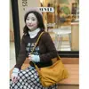 Bolso plisado de nailon nuevo para otoño e invierno 2025 para mujer, bolso versátil para el antebrazo para ir al trabajo, bolso de hombro para viajar, bolso de mamá