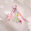 Nuevo Llavero de Flor y Mariposa de Resina Estilo Ins Fresco y Lindo Corazón de Chica Colgante para Mochila Accesorios de Regalo Venta al por Mayor