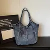 Estilo Coreano Dongdaemun Versátil Bolsa de Ombro Jeans Pequena para Axila Feminina 2026 Nova Pequena de Nicho Casual Sensação de Alto Padrão Bolsa de Ombro Única Tendência