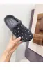 Zapatos de otoño e invierno estilo coreano lunares retro zapatillas peludas 2026 suela gruesa punta cerrada slip-on zuecos de algodón
