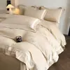Novo conjunto de quatro peças de algodão 100% puro de alta qualidade, simples e luxuoso, feito de algodão de fibra longa com bordado, conjunto de quatro peças estilo lençol com elástico