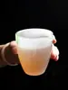 Taza de té de porcelana de jade vidriada verde, separador de té para uso doméstico, taza de té individual resistente al calor y que no quema