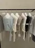 KITTIN 2026 Verano Estilo Coreano Sentido del Diseño Con Cordones Cintura ceñida Adelgazante Cuello Redondo Sin Mangas Tejido Top para Mujer K1053