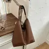 Bolso de Mano Tejido Estilo Coreano Temperamento Bolso de Mujer 2026 Nuevo Pequeño Nicho Simple de Gama Alta Bolso Cubo Bolso de Hombro Único para el Brazo