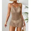 Vestido corto de punto europeo y americano transfronterizo con textura hueca de perspectiva, tirantes finos, sexy, vestido de punto para la playa