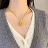 Collar de oro de color duradero, mismo estilo que la tienda de oro, cadena para suéter de estilo nacional, cadena para clavícula de lujo ligero, todo a juego, colgante de collar de alta gama