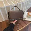 Bolsas da Moda Deste Ano 2026 Verão Novo Estilo Coreano Moda Rebite Personalidade Feminina Transversal Corrente Pequena Quadrada