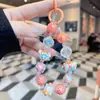 Cadena de Teléfono Móvil con Cuentas Láser Pintadas a Mano de Colores Creativos Llavero de Cristales de Moda Adornos Colgantes para Bolsos de Mano de Alta Gama