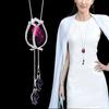 Collar largo de cadena para suéter con accesorios florales transfronterizos para mujer, colgante de borla de cristal, colgante para ropa, joyería simple al por mayor