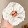 Elástico de cabelo suave e versátil para sair, scrunchie modelo novo 2026 estilo coreano, tiara de renda feminina com senso de atmosfera, atacado